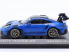 Porsche 911 (992) GT3 RS Weissach package 2023 blue / golden ones rims 1:43 Minichamps
