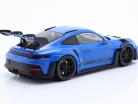 Porsche 911 (992) GT3 RS 2023 blauw / zwart velgen 1:18 Minichamps
