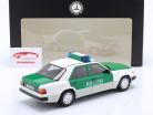 Mercedes-Benz 230E (W124) politi Byggeår 1989-1993 hvid / grøn 1:18 Norev