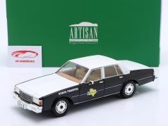 Chevrolet Caprice Texas Public Safety 1987 черный / белый 1:18 Greenlight