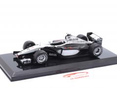 M. Häkkinen McLaren MP4/14 #1 Fórmula 1 Campeão mundial 1999 1:24 Premium Collectibles