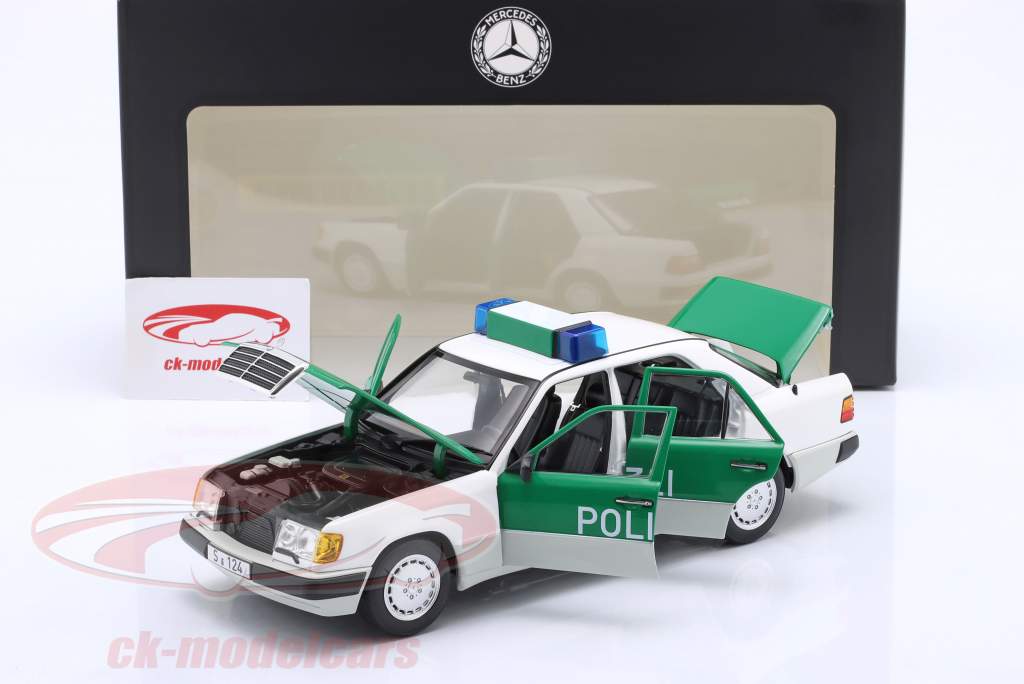 Mercedes-Benz 230E (W124) police Année de construction 1989-1993 blanc / vert 1:18 Norev