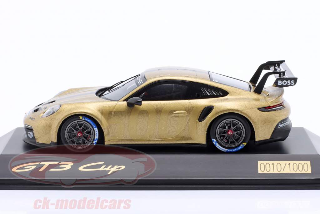 Porsche 911 (992) GT3 Cup 5.000 ouro metálico 1:43 Spark / Limitação #0010