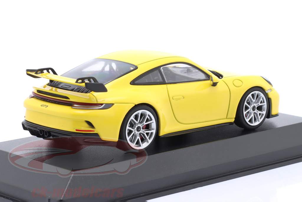 Porsche 911 (992) GT3 year 2020 racing yellow / silver rims 1:43 Minichamps