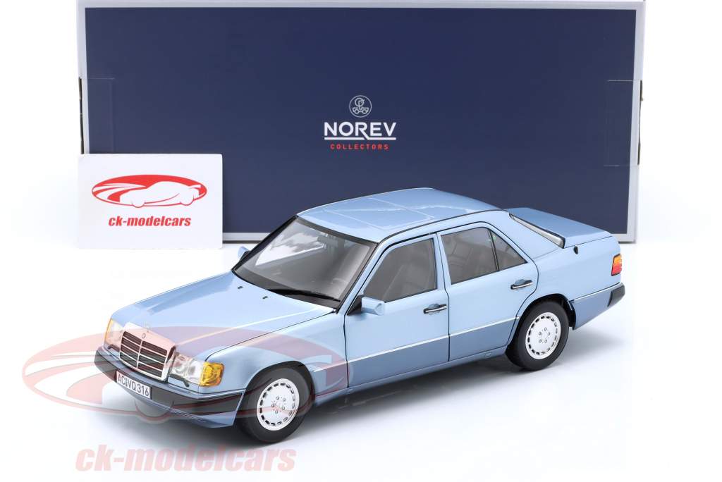 Mercedes-Benz 230E (W124) Anno di costruzione 1990 Azzurro metallico 1:18 Norev